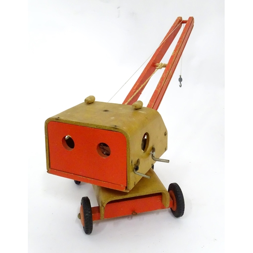 109 - Toy: A scratch built wooden crane with painted detail. Approx. 17