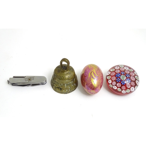 41 - Items to include brass bell, glass paperweight, Rockingham China egg formed pot and cover and pocket... 
