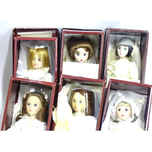 973 - A quantity of Danbury Mint dolls (13)