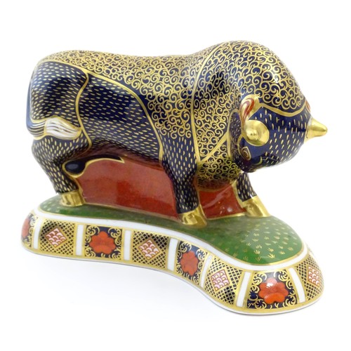 198 - A Royal Crown Derby paperweight modelled as a Grecian Bull decorated in the Imari pattern with gilt ... 