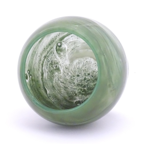 271 - An Art Deco Art Glass bowl with green swirled detail and circular foot. Approx 4