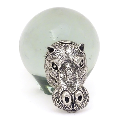 276 - A novelty glass paperweight with pewter mounts formed as a hippo. Approx 4