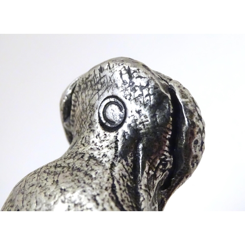 276 - A novelty glass paperweight with pewter mounts formed as a hippo. Approx 4