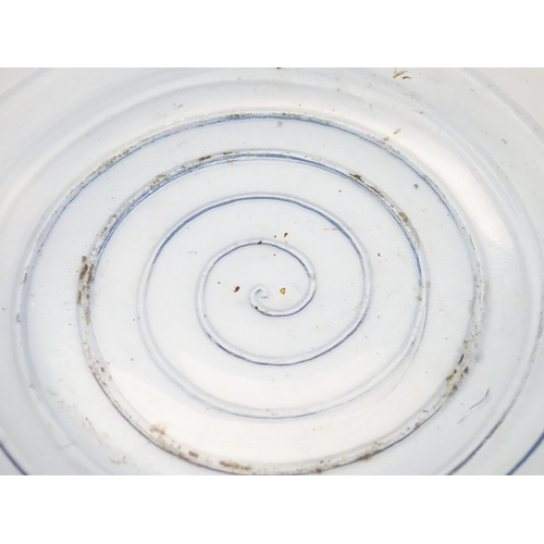 309 - A pale blue glass bowl with swirl detail. Approx 19