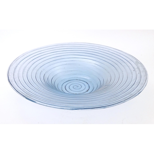 309 - A pale blue glass bowl with swirl detail. Approx 19