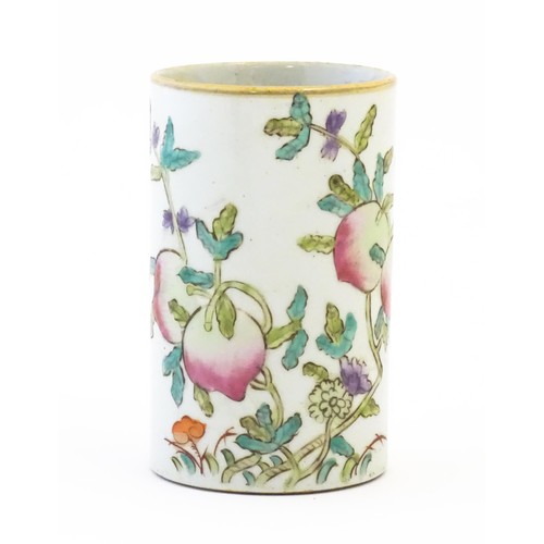 5 - A Chinese famille rose peach brush pot, decorated with peaches, blossom and bats. Approx. 4 3/4