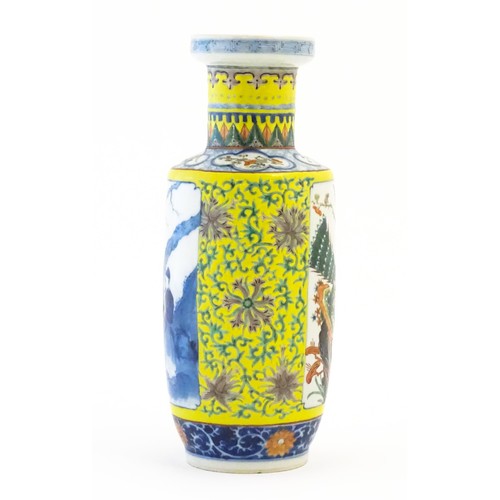 7 - A Chinese famille jeune vase, the yellow ground with scrolling floral and foliate detail, decorated ... 