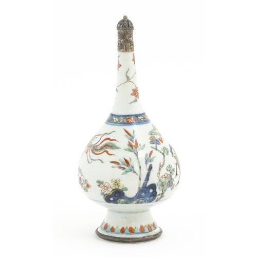 23 - A Chinese Export famille rose rosewater sprinkler decorated with a Phoenix and Quilin / Kylin with t... 