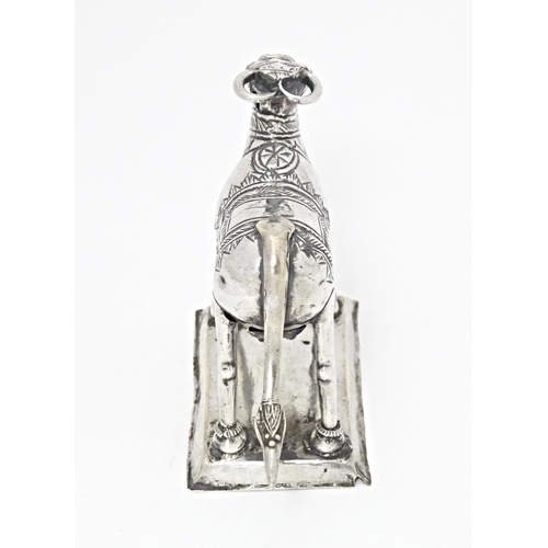 534 - An Indian white metal model of an cow  / ox. Approx. 3