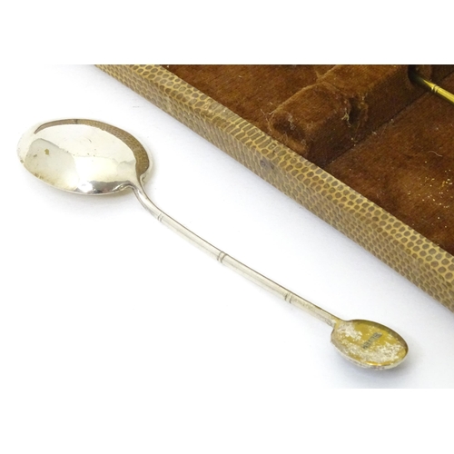 591 - A set of six Oriental style teaspoons with carved jade style detail to handle. Approx. 4 3/4