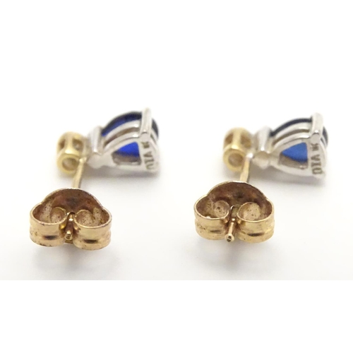 737 - 9ct earrings set with topaz and diamonds 3/8