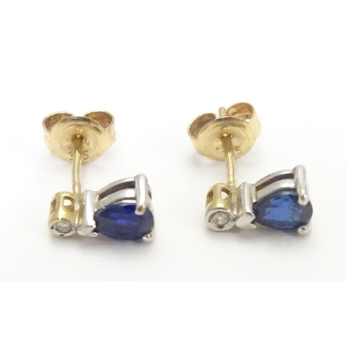 737 - 9ct earrings set with topaz and diamonds 3/8