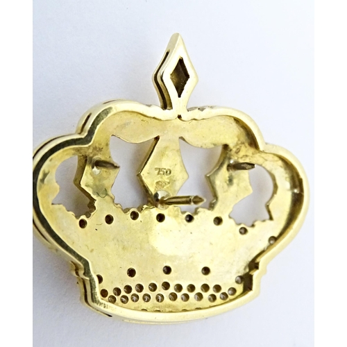 766 - A Continental 18ct gold badge / pin of crown form set with diamonds. Approx. 1 1/4