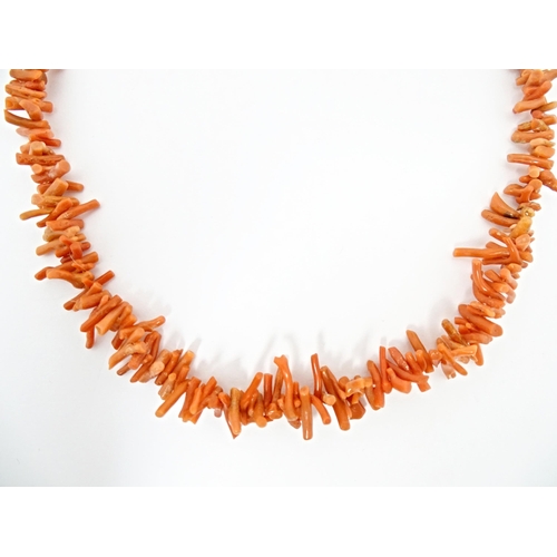 767 - A vintage coral necklace of graduated coral branch beads. Approx. 18