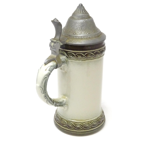 867 - Militaria : a mid 20thC stein tankard, decorated with the insignia of RAF Gütersloh (HQ No.2 Group R... 