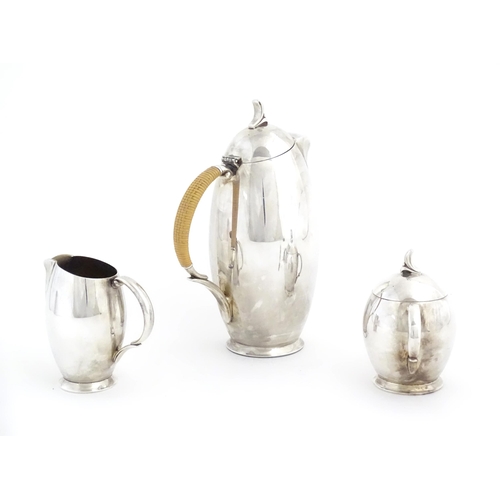 1095 - A 20thC three piece silver plate coffee set by Rogers Bros. in the pattern Flair, comprising coffee ... 