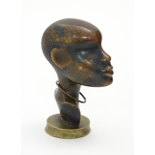 1101 - A 20th century Austrian bronze by Karl Hagenauer, a head of an African man with stamped hair detail ... 