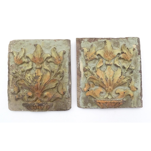 1212 - A pair of early 19thC carved wooden plaques of rectangular form with relief foliate and urn detail w... 