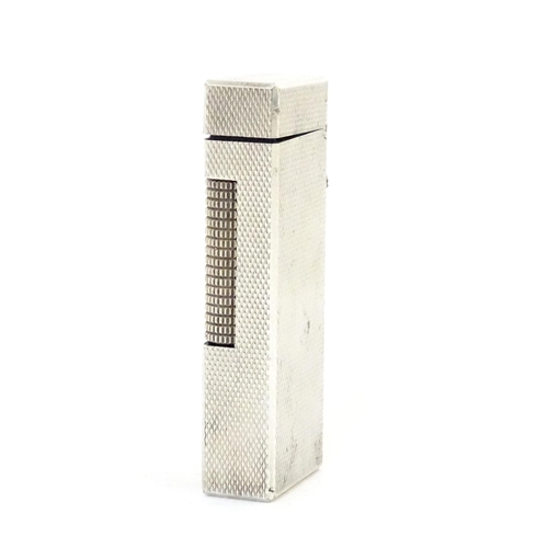 1240 - A late 20thC Dunhill rollagas pocket lighter, with chequered finish, approx 2 1/2