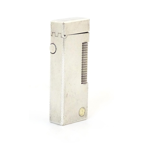 1240 - A late 20thC Dunhill rollagas pocket lighter, with chequered finish, approx 2 1/2