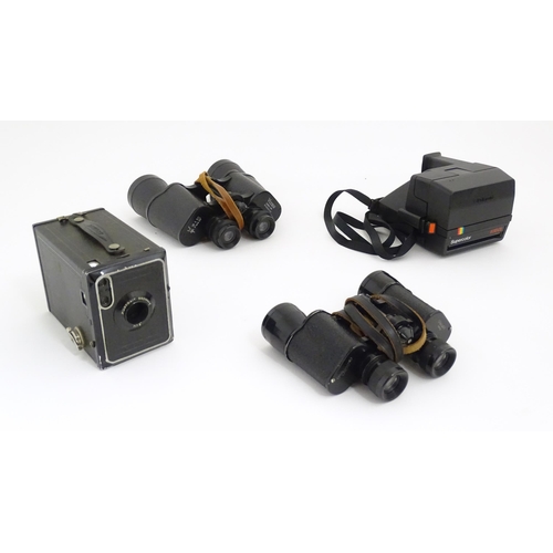 1243 - A quantity of 20thC cameras and binoculars to include a Kodak Retinette 1B camera with instruction b... 