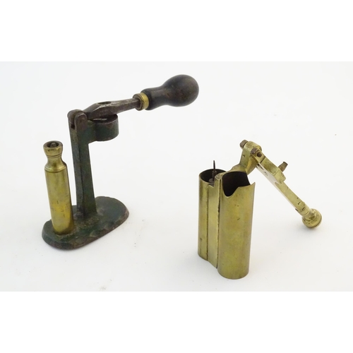 1172A - A quantity of 19thC and later shotgun cartridge reloading tools, comprising a 12 bore 2 1/2