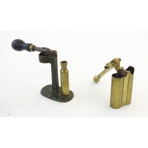 1172A - A quantity of 19thC and later shotgun cartridge reloading tools, comprising a 12 bore 2 1/2