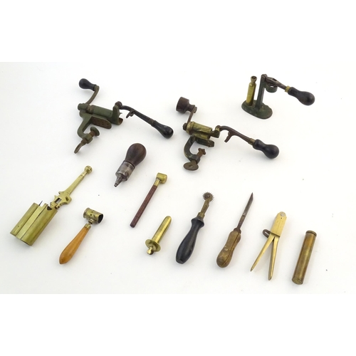 1172A - A quantity of 19thC and later shotgun cartridge reloading tools, comprising a 12 bore 2 1/2