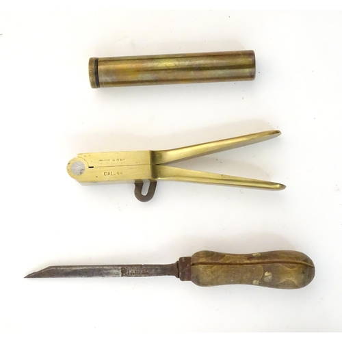 1172A - A quantity of 19thC and later shotgun cartridge reloading tools, comprising a 12 bore 2 1/2