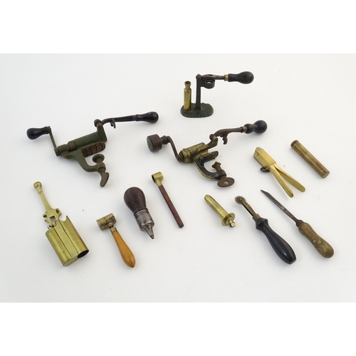 1172A - A quantity of 19thC and later shotgun cartridge reloading tools, comprising a 12 bore 2 1/2