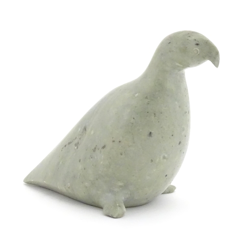 1261 - A 20thC Inuit carved soapstone model of a bird. Indistinctly marked under. Approx. 4