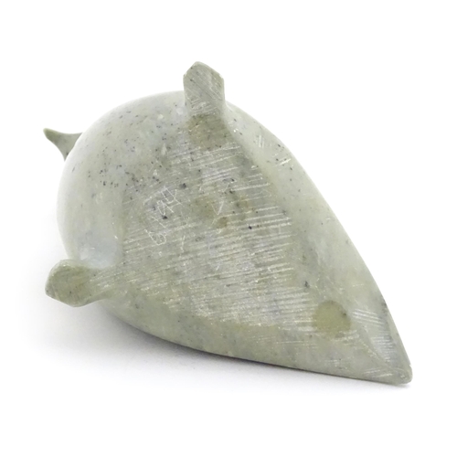 1261 - A 20thC Inuit carved soapstone model of a bird. Indistinctly marked under. Approx. 4