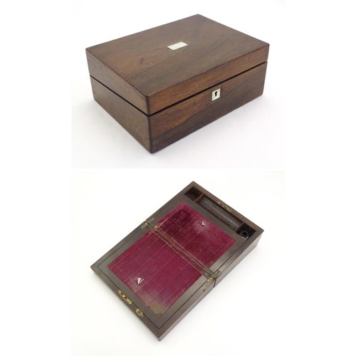 1262 - A Victorian rosewood writing box with inlaid mother of pearl to top, opening to reveal a fitted inte... 