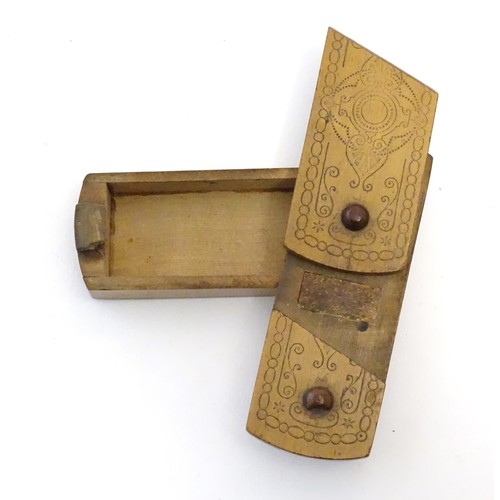 1274 - A late 19th / early 20thC vesta puzzle box with concealed match striker and match keep. Approx. 3 1/... 