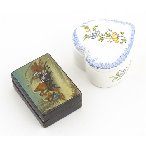 1276 - A Russian lacquered papier mache stamp box the top with hand painted decoration depicting a winter l... 