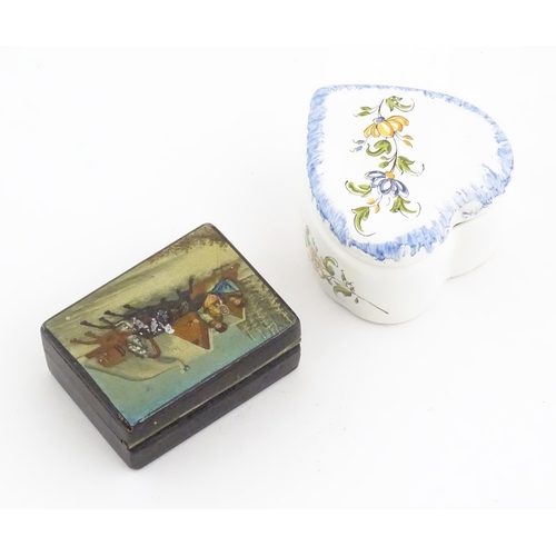 1276 - A Russian lacquered papier mache stamp box the top with hand painted decoration depicting a winter l... 