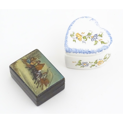 1276 - A Russian lacquered papier mache stamp box the top with hand painted decoration depicting a winter l... 