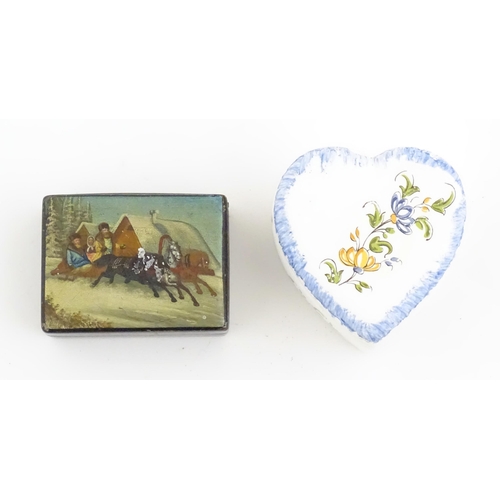 1276 - A Russian lacquered papier mache stamp box the top with hand painted decoration depicting a winter l... 