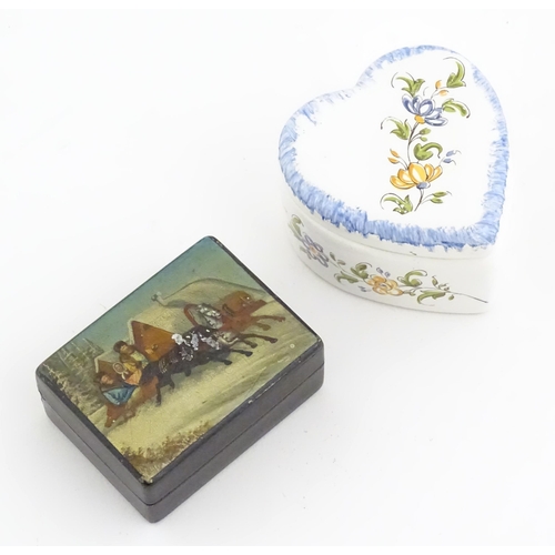 1276 - A Russian lacquered papier mache stamp box the top with hand painted decoration depicting a winter l... 