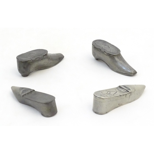 1279 - Four 19thC pewter snuff boxes modelled as shoes. Largest approx. 3 1/2