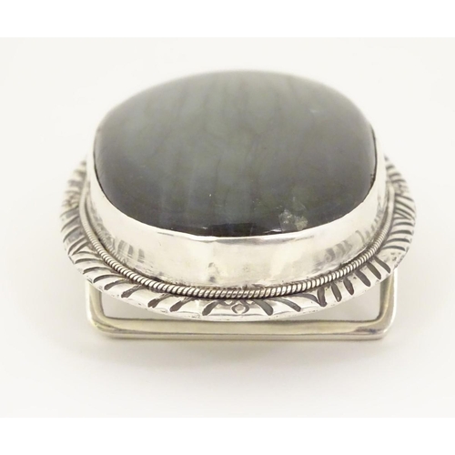 1285 - A buckle set with large labradorite style cabochon to centre. 3 1/4