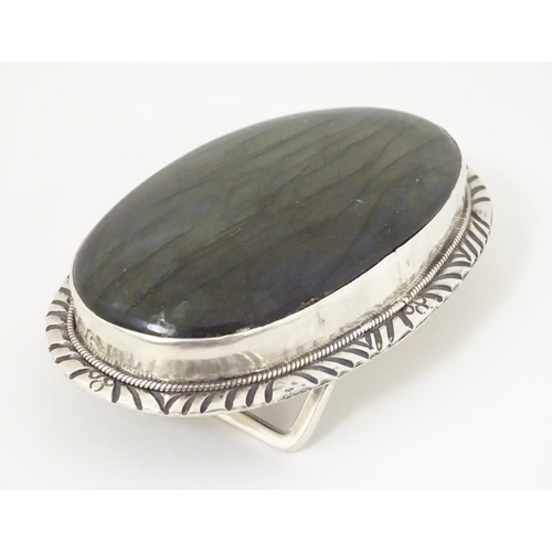 1285 - A buckle set with large labradorite style cabochon to centre. 3 1/4