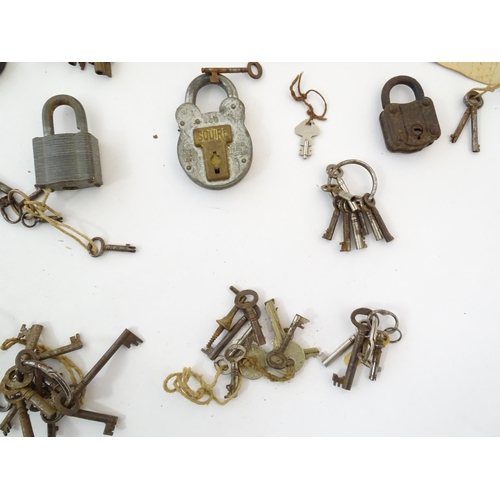 1306 - A large quantity of assorted old keys and padlocks. Various sizes.