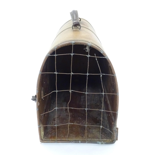 1313 - An early to mid 20thC pet carrier, of bentwood construction with cage door and leather handle. Appro... 