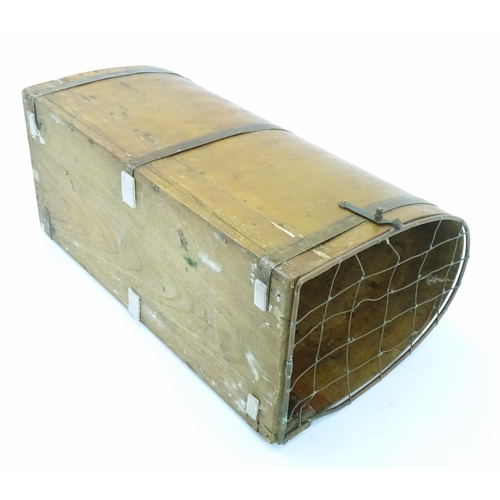 1313 - An early to mid 20thC pet carrier, of bentwood construction with cage door and leather handle. Appro... 