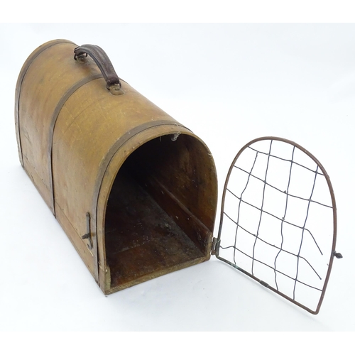 1313 - An early to mid 20thC pet carrier, of bentwood construction with cage door and leather handle. Appro... 