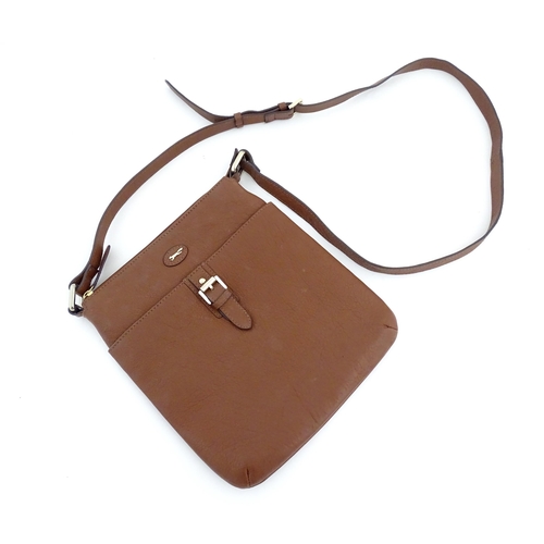 1401 - Vintage fashion / clothing: A Paul Costelloe leather cross body handbag in tan with buckle detail on... 