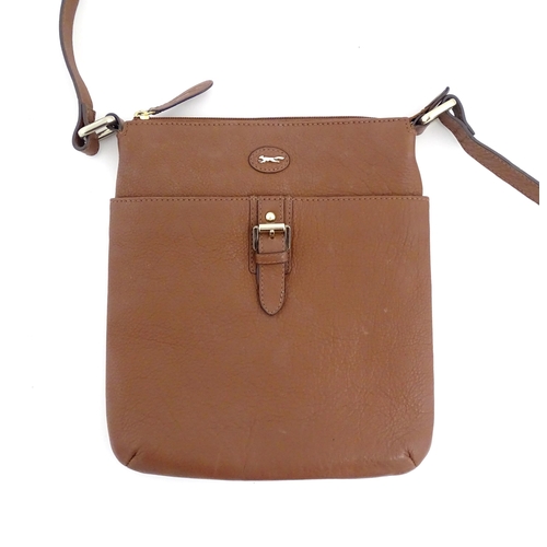 1401 - Vintage fashion / clothing: A Paul Costelloe leather cross body handbag in tan with buckle detail on... 