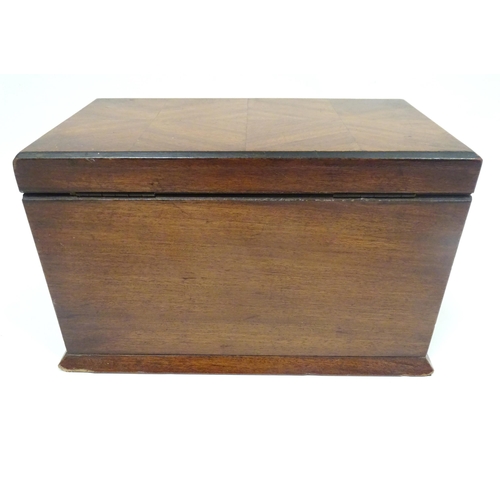 1457 - Toys: An early 20thC games compendium / box, the exterior with chequered mahogany panelling, fitted ... 