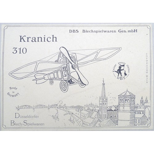 1473 - Toy: A 20thC German tinplate clockwork monoplane / aeroplane, Kranich 310. Made by Dusseldorfer Blec... 